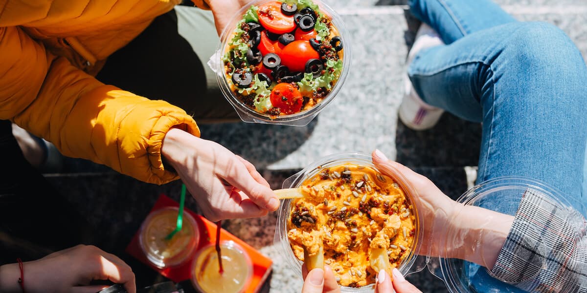 Friends sharing food